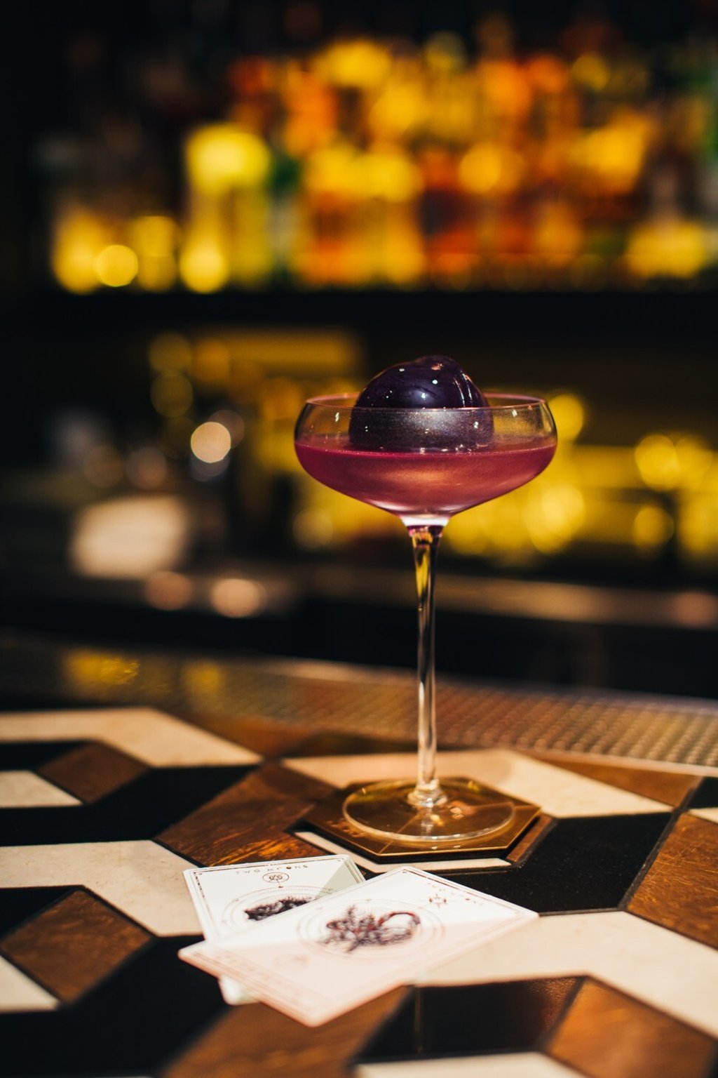 The Full Moon Ritual cocktail at Room 309 boasts a giant (moon-like) tea ice ball. Photo: Justin Lim