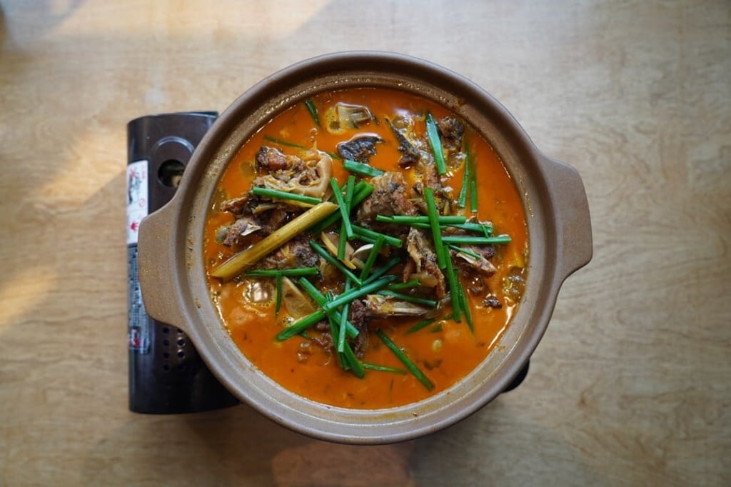 Yunnan Dali carved plums boiled fish in sour soup at Cravings. Photo: Tom Wang