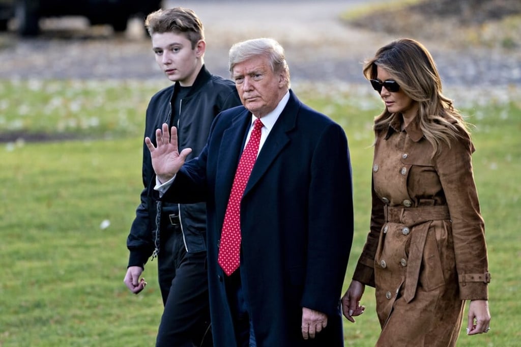 US President Donald Trump with first lady Melania Trump and their son Barron on the South Lawn of the White House. Photo: Bloomberg