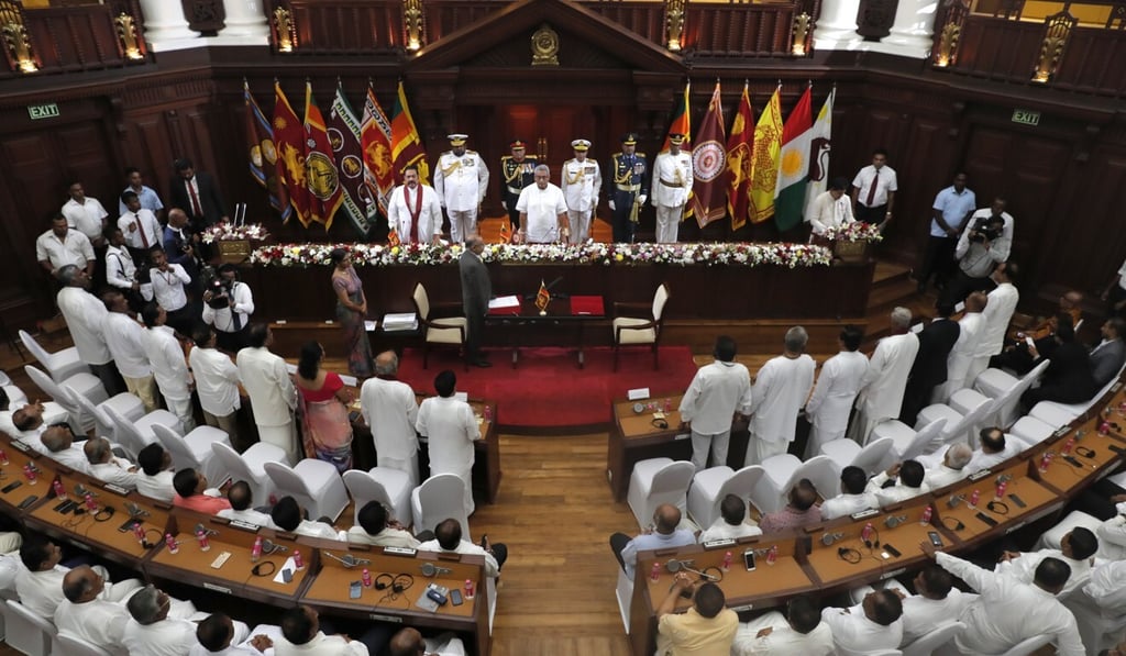 President Gotabaya Rajapaksa, centre, pictured in parliament during an oath-taking ceremony of his new cabinet last year. Photo: AP