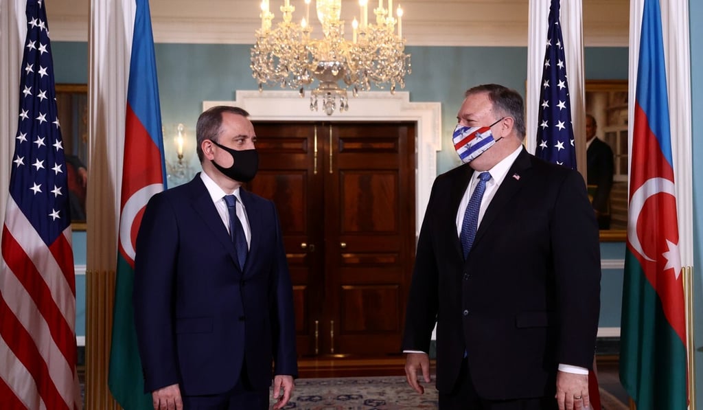 Azerbaijan's Foreign Minister Jeyhun Bayramov, left, meets US Secretary of State Mike Pompeo to discuss the conflict in Nagorno-Karabakh, at the State Department in Washington on Friday. Photo: Reuters