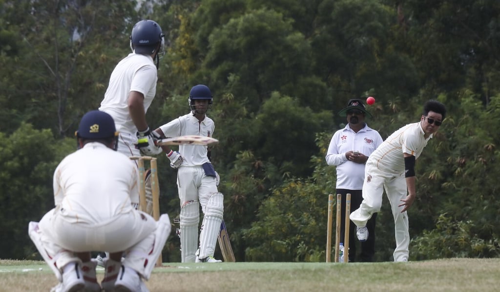 Qilin captain Leonard Tan bowls for his team against Hong Kong University. Photo: SCMP / Jonathan Wong