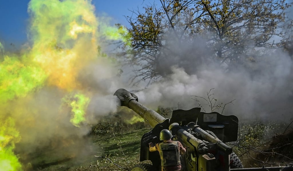 An Armenian soldier fires artillery on October 25 during the ongoing fighting between Armenian and Azerbaijani forces over the breakaway region of Nagorno-Karabakh. Photo: AFP