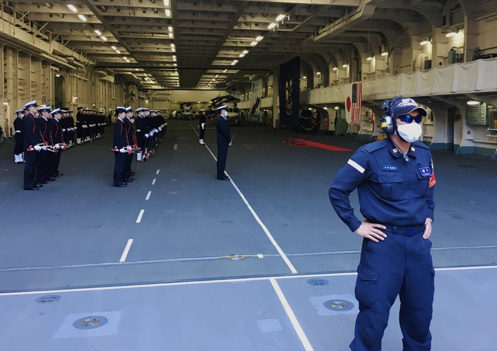Japan Maritime Self-Defense Force soldiers on board the helicopter destroyer JS Kaga on October 26, 2020. Photo: Reuters