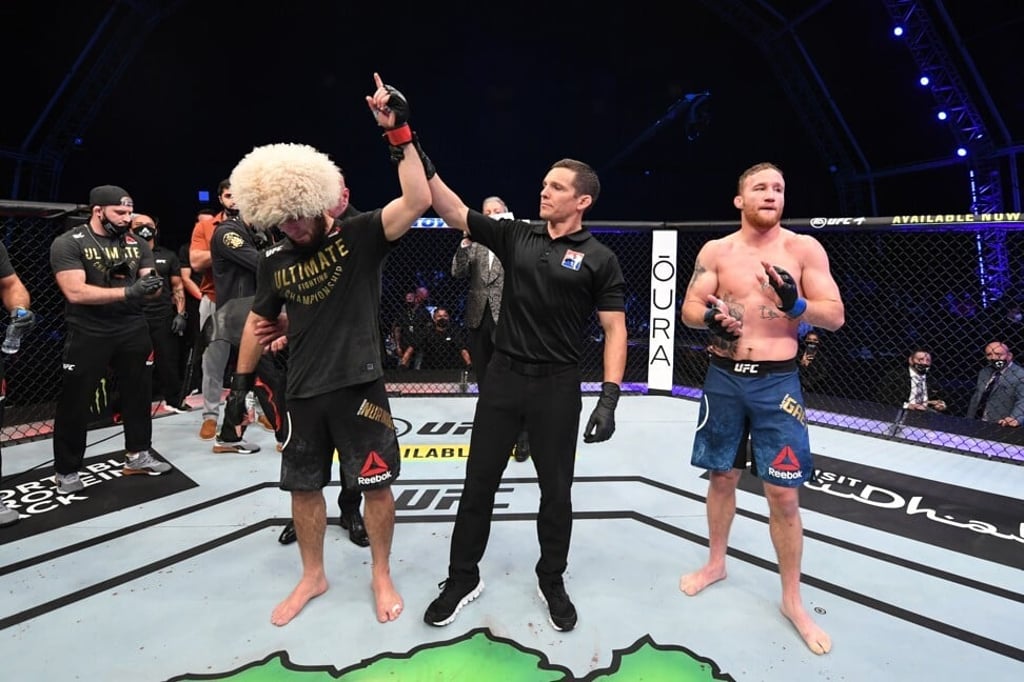 Khabib Nurmagomedov celebrates his victory over Justin Gaethje in their lightweight title bout at UFC 254. Photo: Josh Hedges/Zuffa LLC via Getty Images