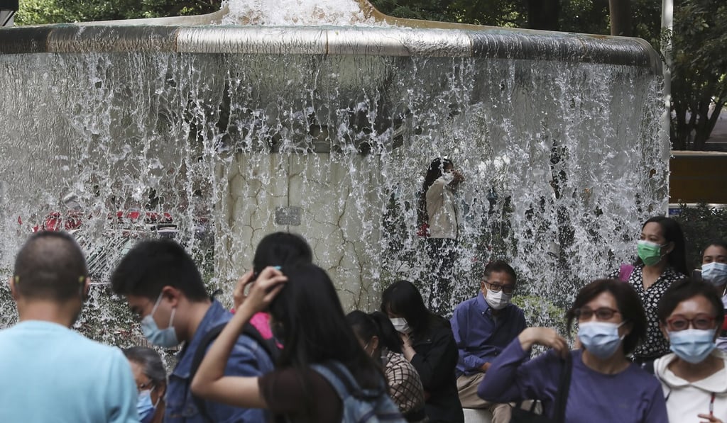 Visitors with face masks at Hong Kong park in Admiralty this month amid the coronavirus infections. Photo: SCMP / Jonathan Wong Visitors with face masks at Hong Kong park in Admiralty this month amid the coronavirus infections. Photo: SCMP / Jonathan Wong