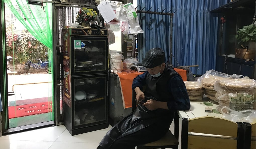 Small grocery shops are among the few retail outlets allowed to open. Photo: Qin Chen