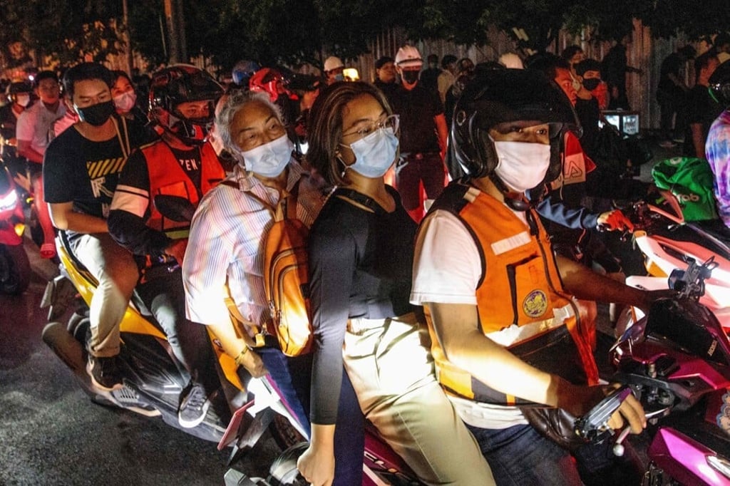 Motorcycle taxi riders ferrying protesters after a rally in Bangkok. Photo: AFP Motorcycle taxi riders ferrying protesters after a rally in Bangkok. Photo: AFP