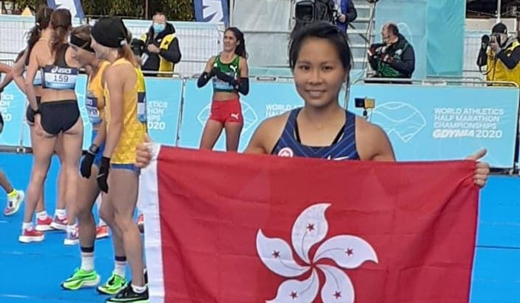 Christy Yiu celebrates after shattering her own Hong Kong record at the half marathon World Championships in Poland. Photo: HKAAA