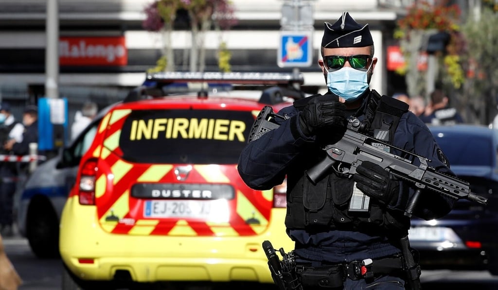 A security officer guards the area after a reported knife attack at Notre Dame church in Nice, France, on Thursday. Photo: Reuters