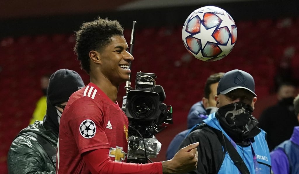 Manchester United’s Marcus Rashford celebrates his hat-trick after the Uefa Champions League group match against RB Leipzig at Old Trafford. Photo: DPA Manchester United’s Marcus Rashford celebrates his hat-trick after the Uefa Champions League group match against RB Leipzig at Old Trafford. Photo: DPA
