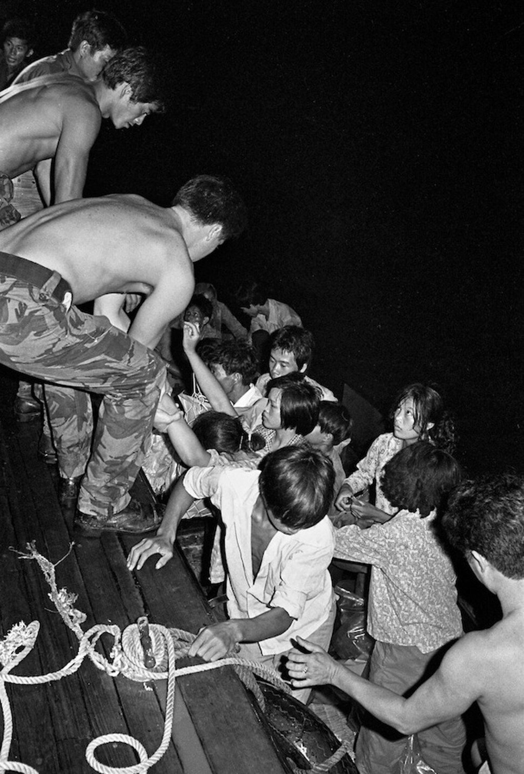 The Royal Hong Kong Police’s Small Boat Unit intercepts a boatload of illegal immigrants from China in 1977. Photo: Courtesy Les Bird The Royal Hong Kong Police’s Small Boat Unit intercepts a boatload of illegal immigrants from China in 1977. Photo: Courtesy Les Bird