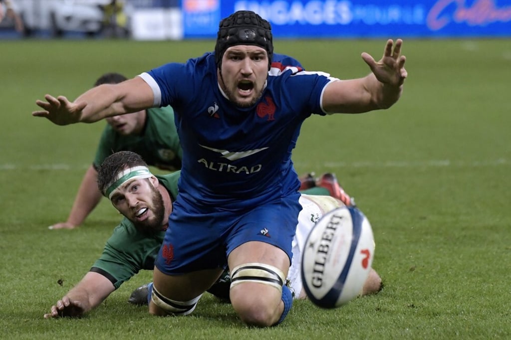 France’s Francois Cros is tackled by Ireland’s Caelan Doris as the hosts battle to a 35-27 win. Photo: EPA