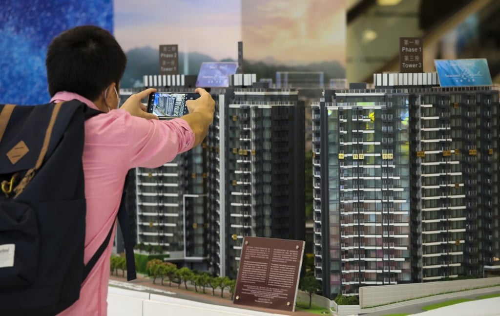 Property buyers viewing the Starfront Royale project in Tuen Mun, at the Tsim Sha Tsui sales office of Hong Kong Ferry and Empire Group on November 1, 2020.