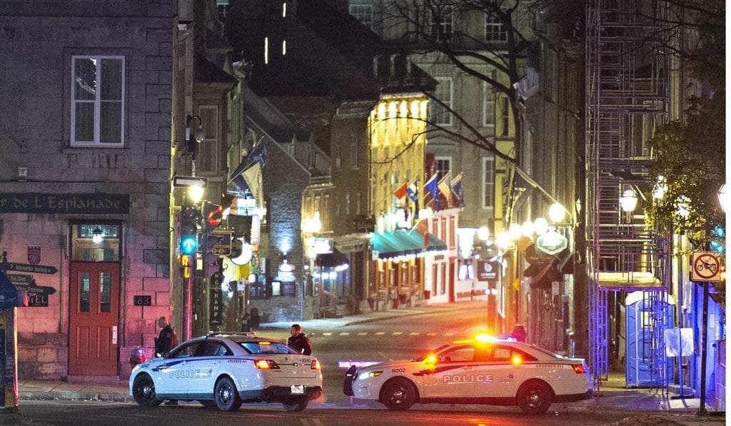 Police cars block the Saint-Louis Street near the Chateau Frontenac early on Sunday after the stabbing rampage. Photo: AP Police cars block the Saint-Louis Street near the Chateau Frontenac early on Sunday after the stabbing rampage. Photo: AP