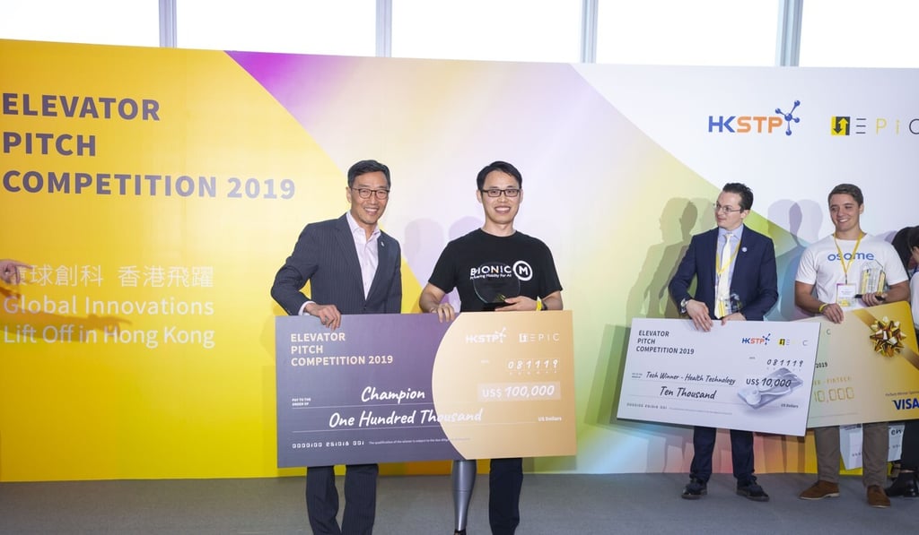 Last year’s EPiC champion was artificial intelligence and robotics company BionicM. Founder and CEO Sun Xiaojun (second left) received the top prize from Albert Wong, CEO of Hong Kong Science and Technology Parks Corporation, at the 2019 event. Photo: Frank Freeman
