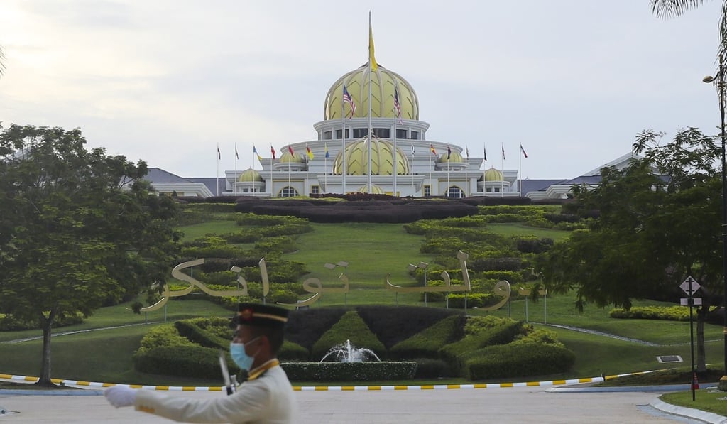 A soldier guards the Malaysian National Palace in Kuala Lumpur,. Photo: EPA A soldier guards the Malaysian National Palace in Kuala Lumpur,. Photo: EPA