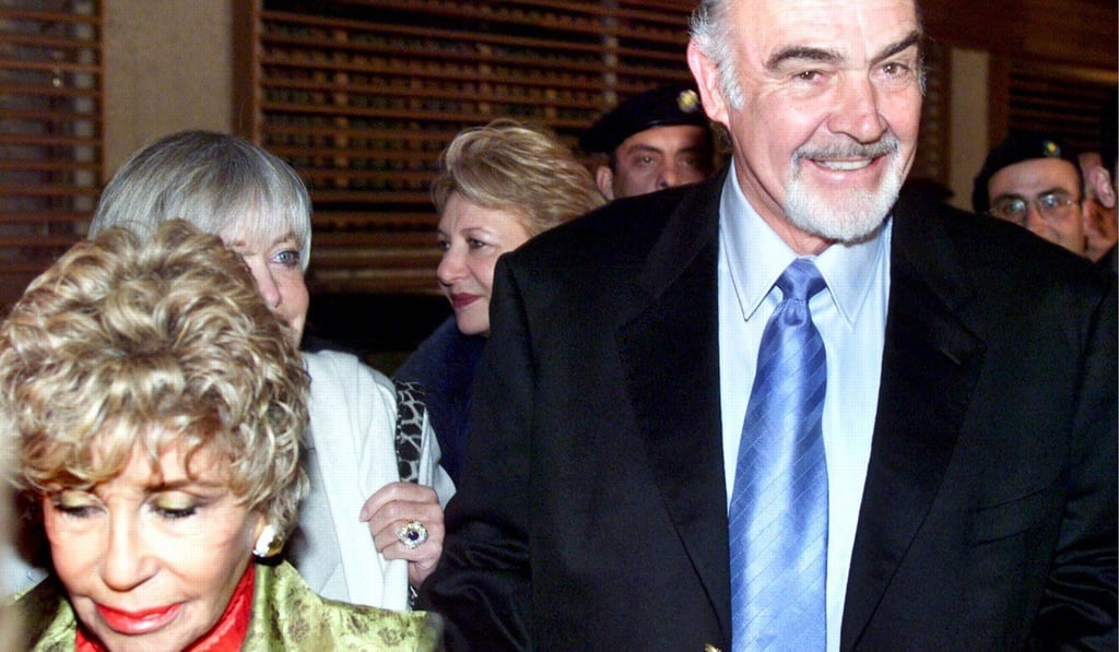 Actor Sean Connery accompanies his wife Micheline Roquebrune to open an exhibition of her paintings at a gallery in Athens, Greece in January 2001. Photo: EPA-EFE Actor Sean Connery accompanies his wife Micheline Roquebrune to open an exhibition of her paintings at a gallery in Athens, Greece in January 2001. Photo: EPA-EFE