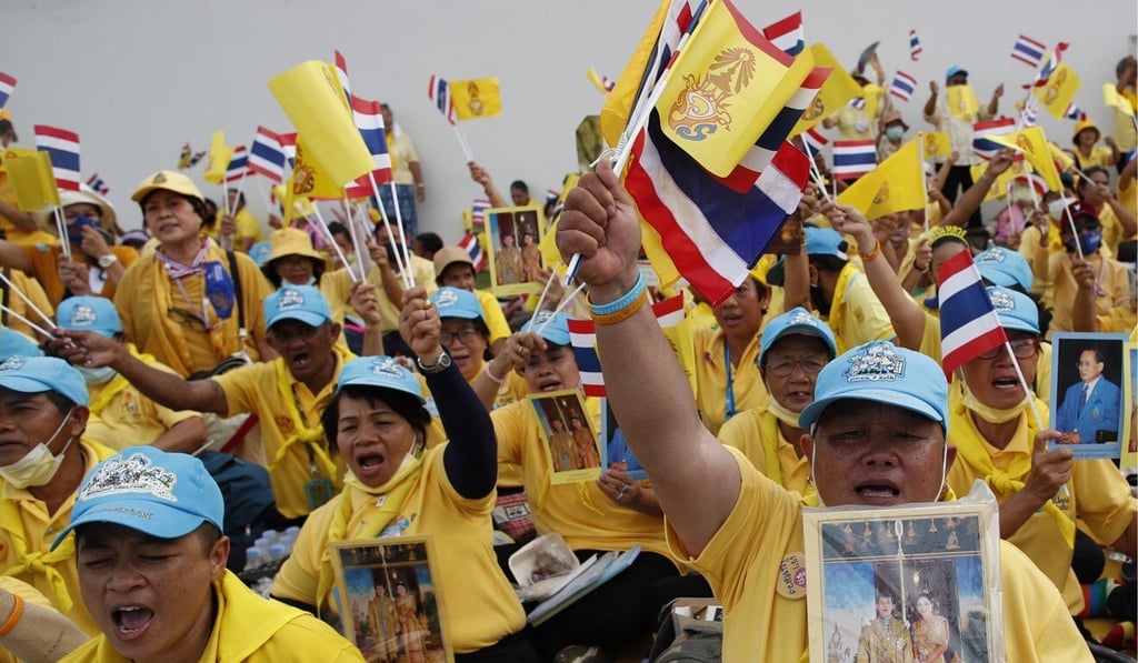 Thai royalists in yellow attire take part in a rally outside the Grand Palace in Bangkok on Sunday. Photo: EPA-EFE Thai royalists in yellow attire take part in a rally outside the Grand Palace in Bangkok on Sunday. Photo: EPA-EFE