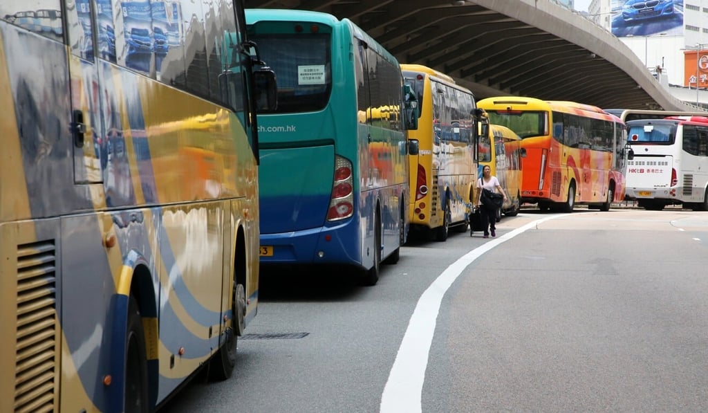 Coaches for mainland tourist groups parked in To Kwa Wan in April 2019. The influx of day trippers disrupted local lives in the area, with protest marchers later in the year asserting that “Hung Hom and To Kwa Wan are not tourism hotspots”. Photo: Felix Wong Coaches for mainland tourist groups parked in To Kwa Wan in April 2019. The influx of day trippers disrupted local lives in the area, with protest marchers later in the year asserting that “Hung Hom and To Kwa Wan are not tourism hotspots”. Photo: Felix Wong