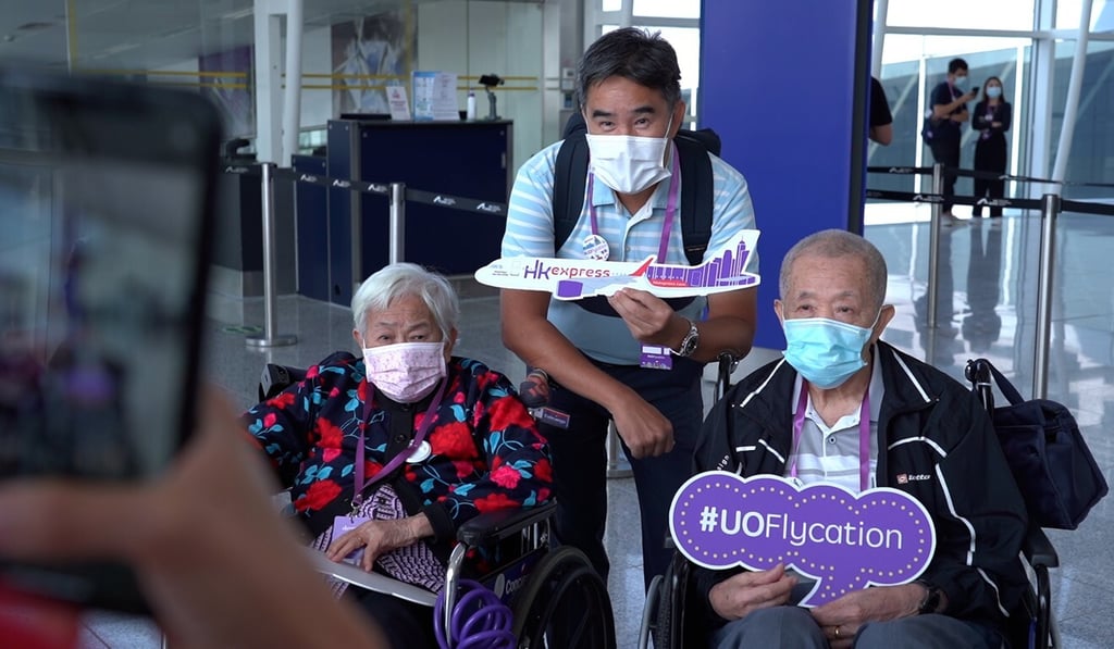 Passengers wait to get on board the ‘flight to nowhere’. Photo: Handout