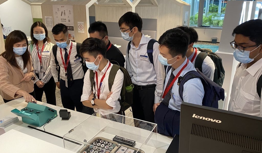 Talent from the Technology Leaders of Tomorrow programme visit AI Plug at Hong Kong Science Park, which supports artificial intelligence technology development.