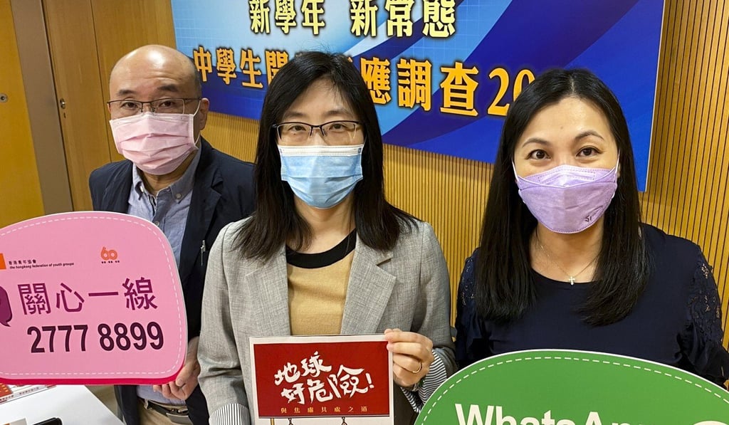 HKFYG unit-in-charge Ken Hui, services coordinator Hsu Siu-man and team leader of school social work unit Yrainse Lam present the survey results on Thursday. Photo: Chan Ho-him