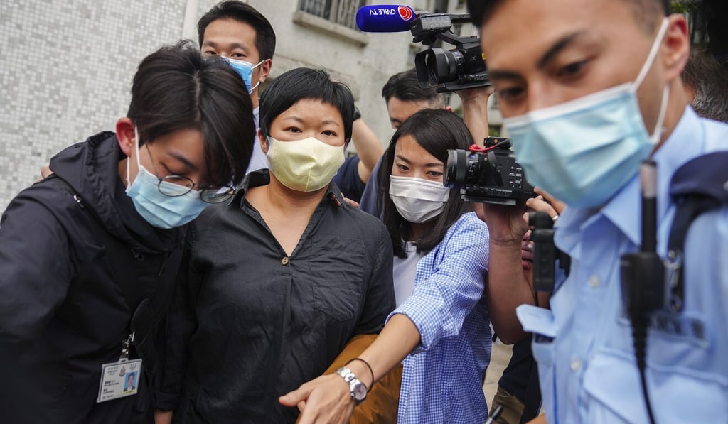 RTHK contributor Choy Yuk-ling is arrested by police. Photo: Sam Tsang