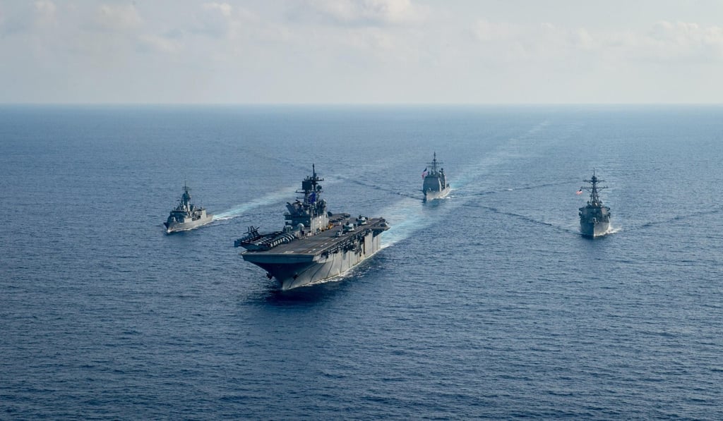 US and Australian Navy ships on patrol in the South China Sea in April. Photo: Reuters US and Australian Navy ships on patrol in the South China Sea in April. Photo: Reuters