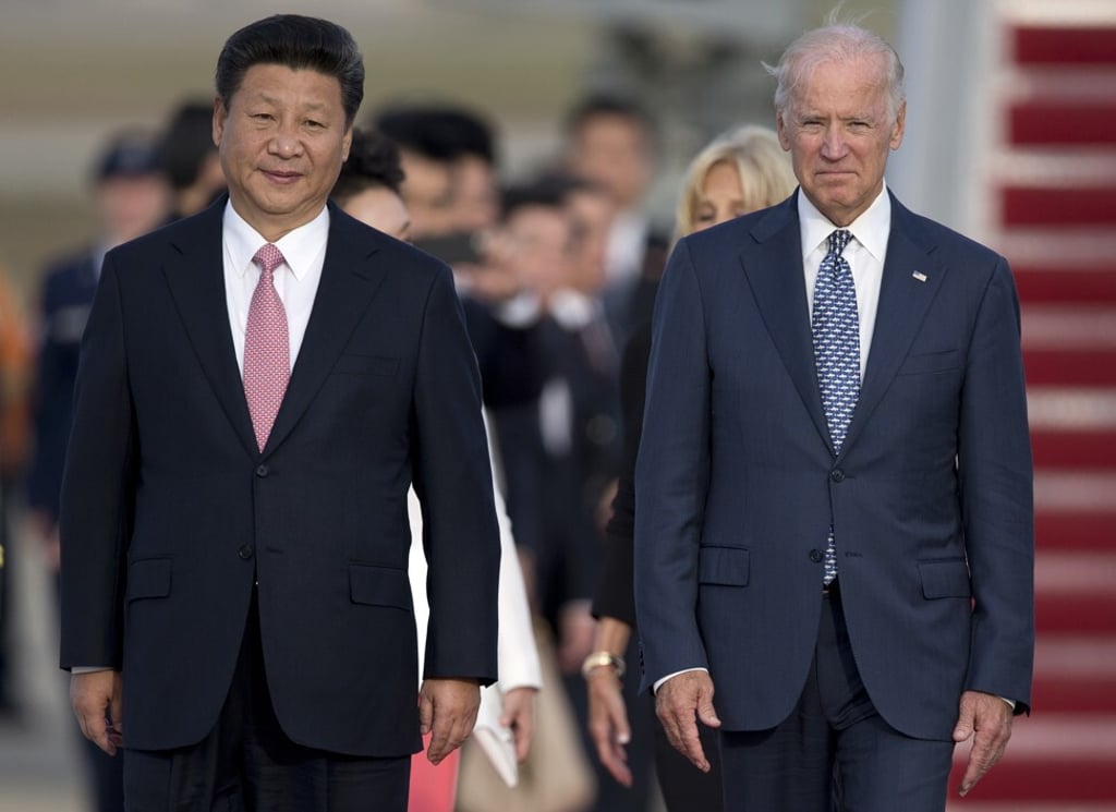 Chinese President Xi Jinping and then vice president Joe Biden at a welcoming ceremony for the Chinese delegation at the Andrews Air Force Base, in Maryland on Thursday, September 24, 2015. Photo: AP