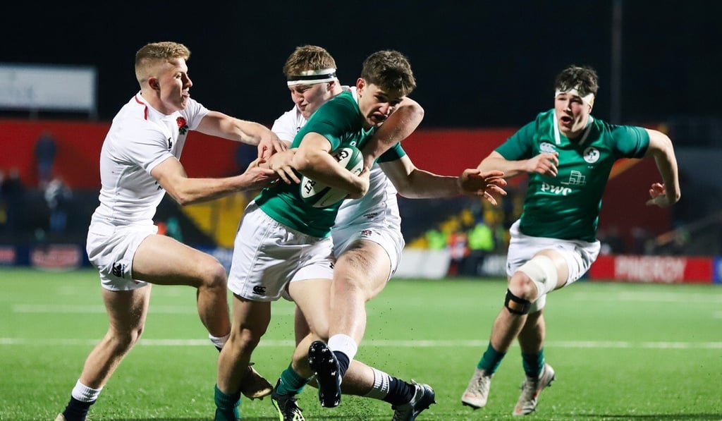 Two England rugby union players try to stop an Ireland breakaway during a Six Nations Under 20s Championship match in Cork. Photo: D Ribeiro / Shutterstock Two England rugby union players try to stop an Ireland breakaway during a Six Nations Under 20s Championship match in Cork. Photo: D Ribeiro / Shutterstock
