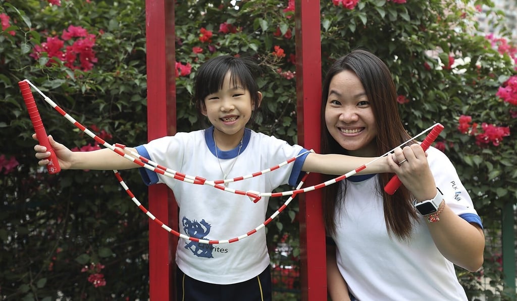 Karena Tsang, 7, and mother Jade Mok Lau-fong are part of a pilot project aimed at getting kids into activities from a young age. Photo: Xiaomei Chen