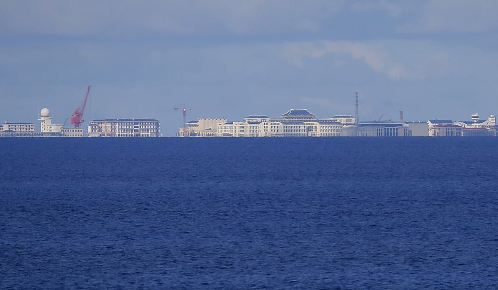 Chinese structures on the man-made Subi Reef in the Spratly island chain are seen from Thitu Island in the South China Sea on April 21, 2017. Photo: AP