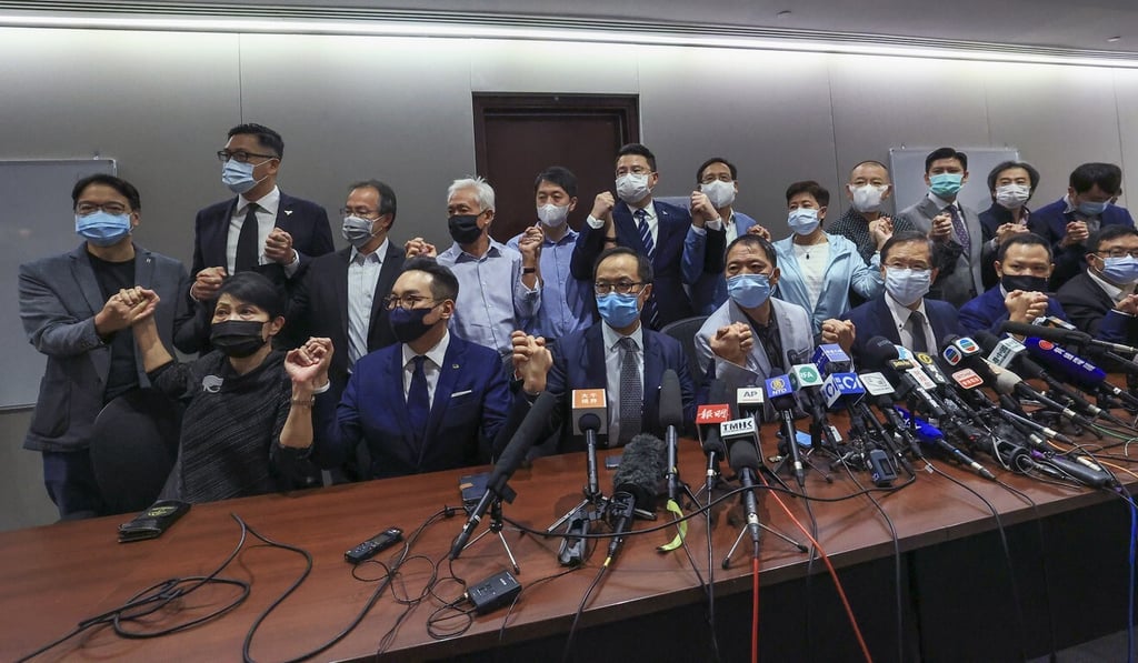 Opposition lawmakers pledge in a press conference at Legco on Wednesday to resign in protest against a recent resolution by Beijing. Photo: May Tse Opposition lawmakers pledge in a press conference at Legco on Wednesday to resign in protest against a recent resolution by Beijing. Photo: May Tse