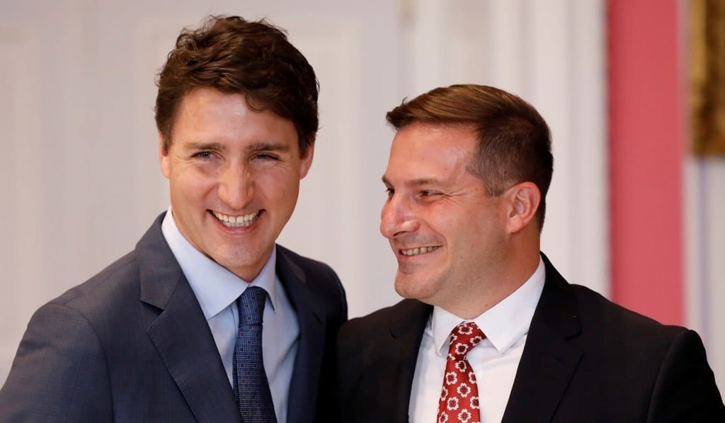 Marco Mendicino (right) poses with Canada’s Prime Minister Justin Trudeau after being sworn-in as Minister of Immigration, Refugees and Citizenship in Ottawa in November 2019. Photo: Reuters