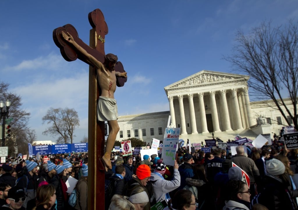 Anti-abortion activists march outside the Supreme Court building in Washington on January 18, 2019. The movement has been bolstered by Trump’s support. Photo: AP