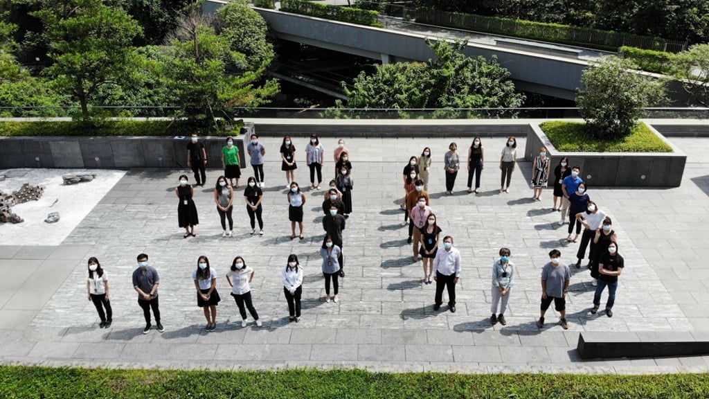 Asia Society Hong Kong Centre staff celebrate the society’s 30th anniversary. Photo: Asia Society Hong Kong Centre