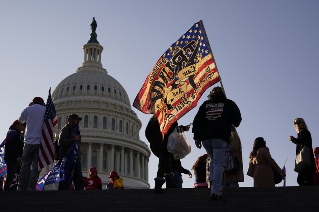 Supporters of US President Donald Trump attend a pro-Trump march on November 14, 2020, in Washington DC. Photo: AP Supporters of US President Donald Trump attend a pro-Trump march on November 14, 2020, in Washington DC. Photo: AP