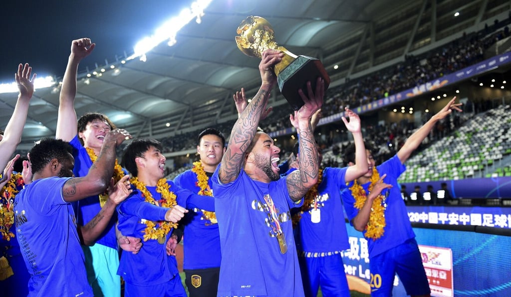 The champions celebrate with the fans in Suzhou. Photo: Xinhua