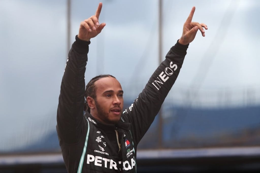 Mercedes driver Lewis Hamilton of Britain reacts after winning the Formula One Turkish Grand Prix at the Istanbul Park circuit on November 15. Photo: Pool via AP Mercedes driver Lewis Hamilton of Britain reacts after winning the Formula One Turkish Grand Prix at the Istanbul Park circuit on November 15. Photo: Pool via AP
