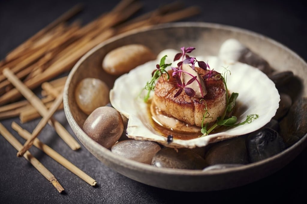 Hokkaido scallop with chestnut jus poulet from Takumi by Daisuke Mori. Photo: Takumi by Daisuke Mori