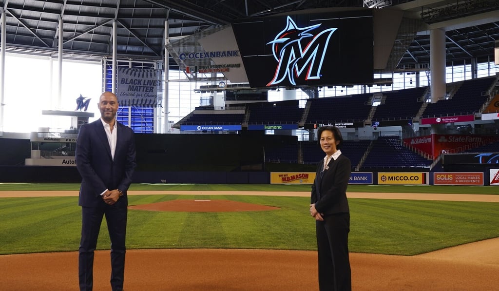 New Miami Marlins general manager Kim Ng, right, and CEO Derek Jeter at Marlins Park stadium before Ng was introduced during a virtual news conference. Photo: AP New Miami Marlins general manager Kim Ng, right, and CEO Derek Jeter at Marlins Park stadium before Ng was introduced during a virtual news conference. Photo: AP