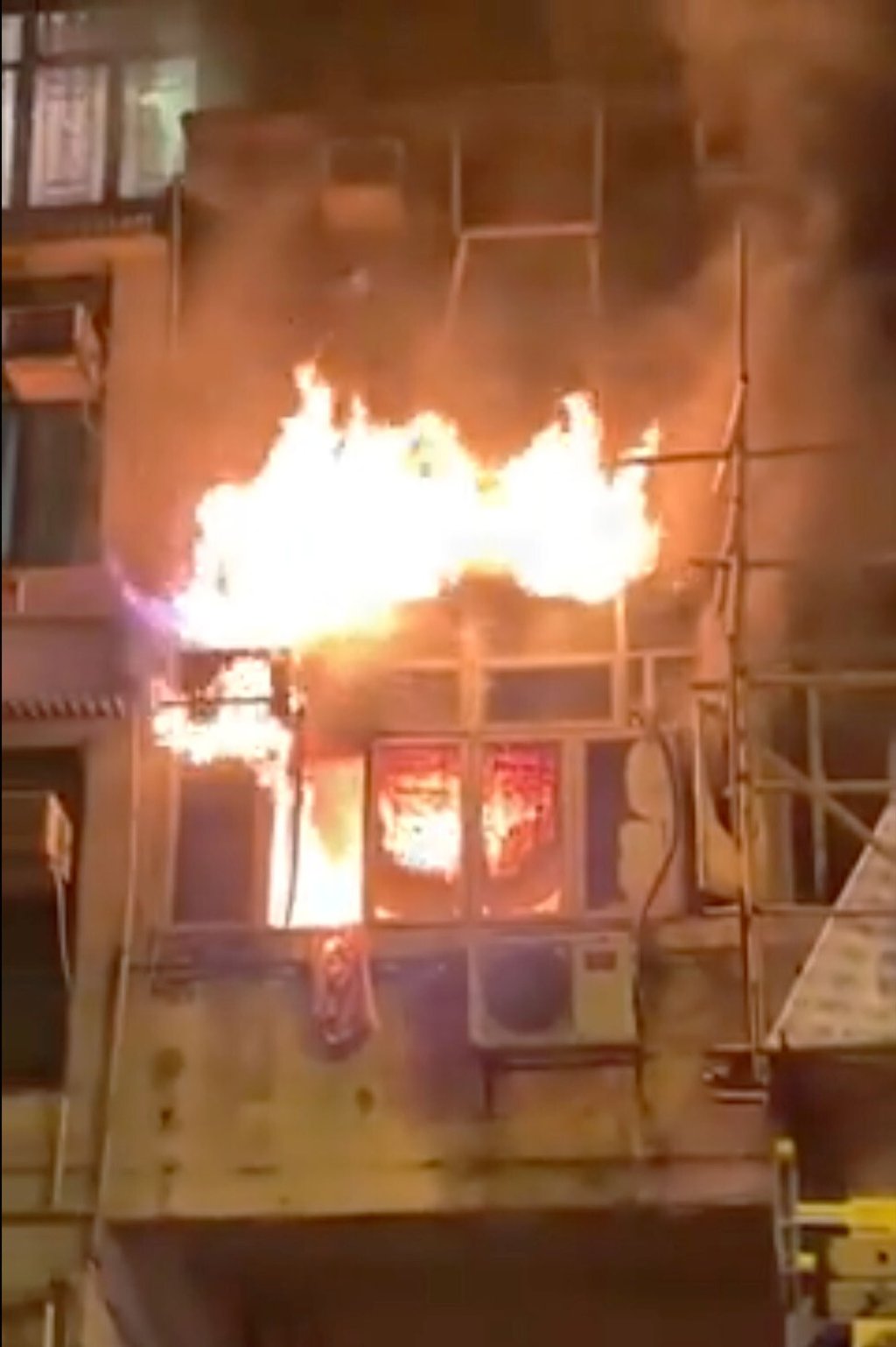 The fire is seen in Yau Ma Tei on Sunday. The fire is seen in Yau Ma Tei on Sunday.