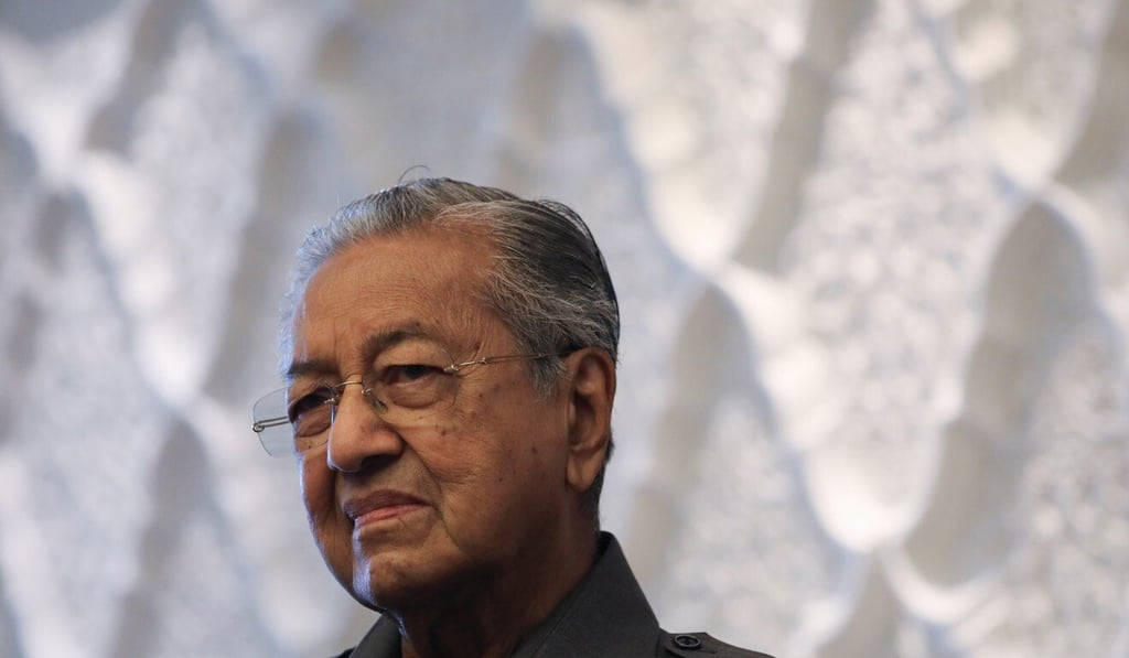 Low spoke to officials in the administration of Mahathir Mohamad, the recordings show. Photo: Reuters Low spoke to officials in the administration of Mahathir Mohamad, the recordings show. Photo: Reuters