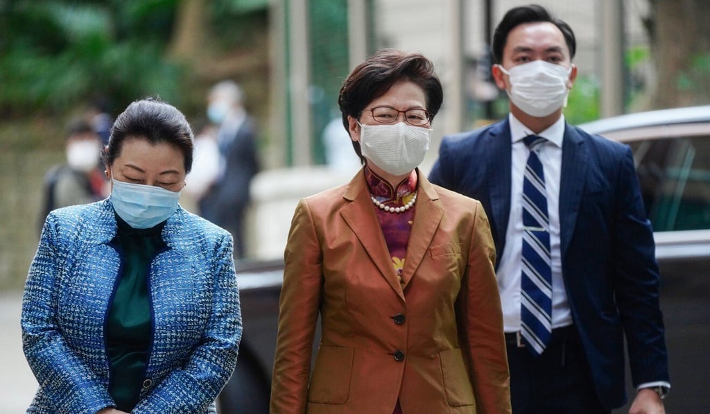 Chief Executive Carrie Lam (centre) and Secretary for Justice Teresa Cheng (left) arrive at the Basic Law 30th Anniversary Legal Summit on Tuesday. Photo: Sam Tsang
