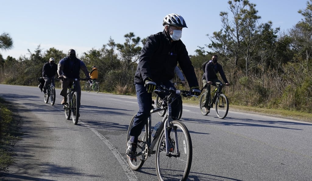 President-elect Joe Biden rides a bike in Lewes, Delaware. Photo: AP