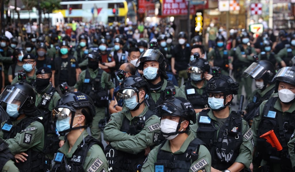 Police officers stand guard during a banned rally on China‘s National Day in Hong Kong on October 1, 2020. Photo: EPA-EFE