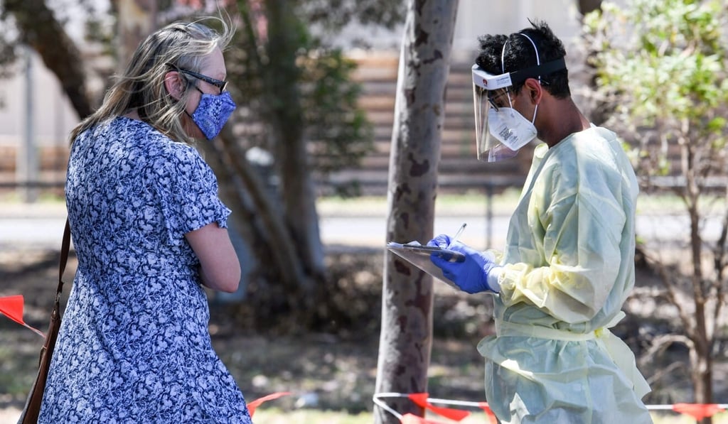 Medical staff at Parafield Airport in Adelaide during day one of total lockdown across the state on November 18, 2020. Photo: AFP