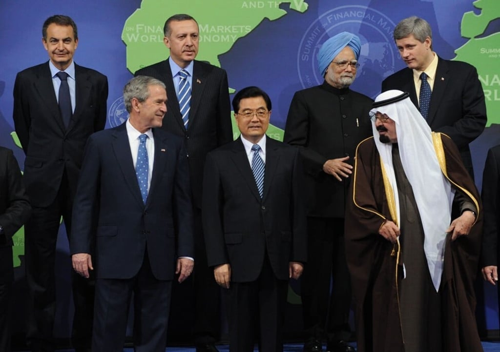 Then US president George W. Bush (front, left) exchanges greetings with Saudi Arabia’s King Abdullah as they pose for photos with other G20 leaders, including then Chinese president Hu Jintao (centre), in Washington in November 2008. Bush convened the meeting in the wake of the global financial crisis. Photo: Reuters Then US president George W. Bush (front, left) exchanges greetings with Saudi Arabia’s King Abdullah as they pose for photos with other G20 leaders, including then Chinese president Hu Jintao (centre), in Washington in November 2008. Bush convened the meeting in the wake of the global financial crisis. Photo: Reuters
