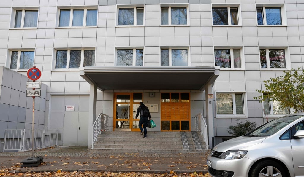 A man on Friday enters a residential building in Berlin’s Lichtenberg district, where a presumed victim of cannibalism was reported to live. Photo: AFP A man on Friday enters a residential building in Berlin’s Lichtenberg district, where a presumed victim of cannibalism was reported to live. Photo: AFP